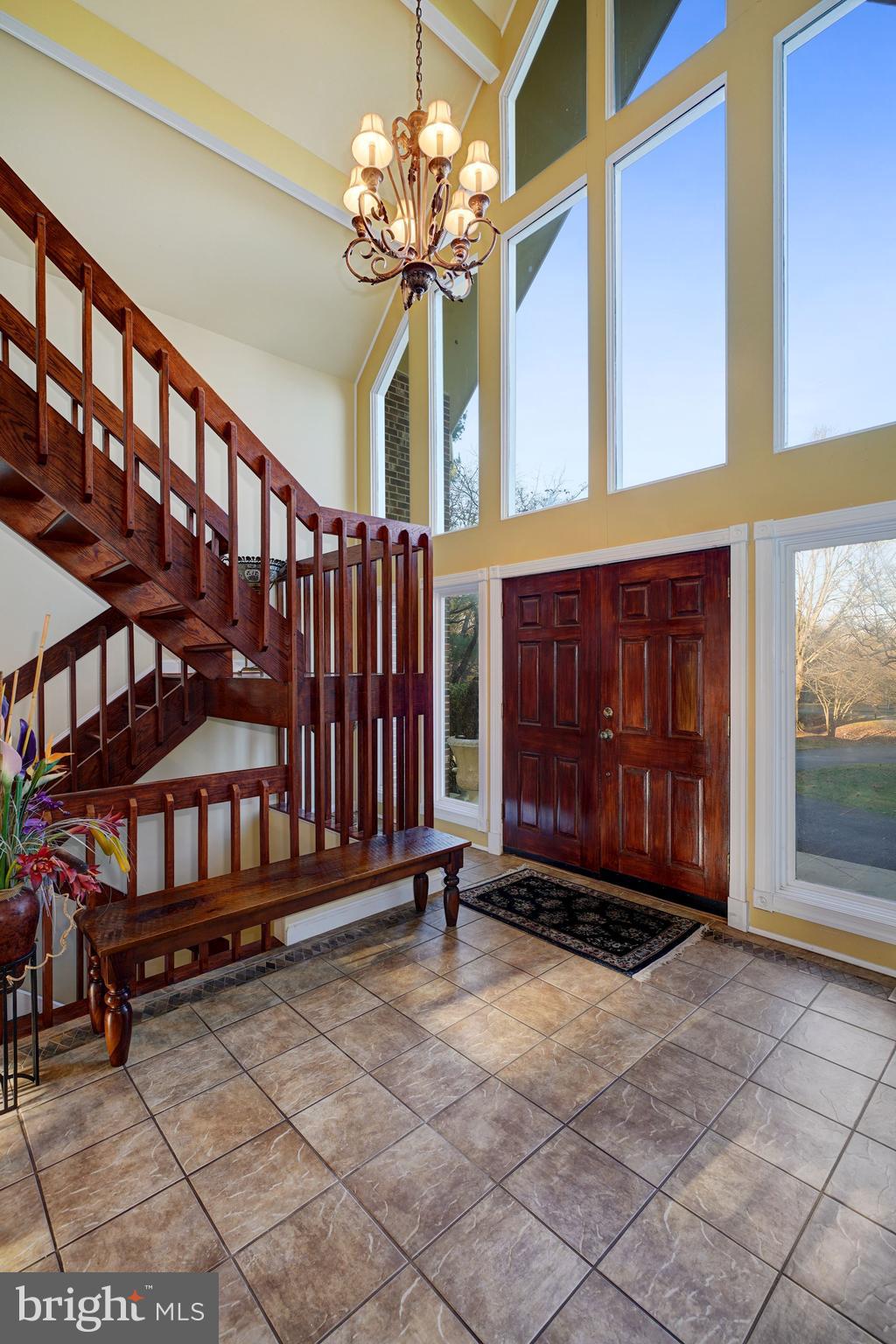 6 Travilah Terrace Potomac, MD 20854 - Photo 6 of 49 Open Staircase and Large Picture Windows