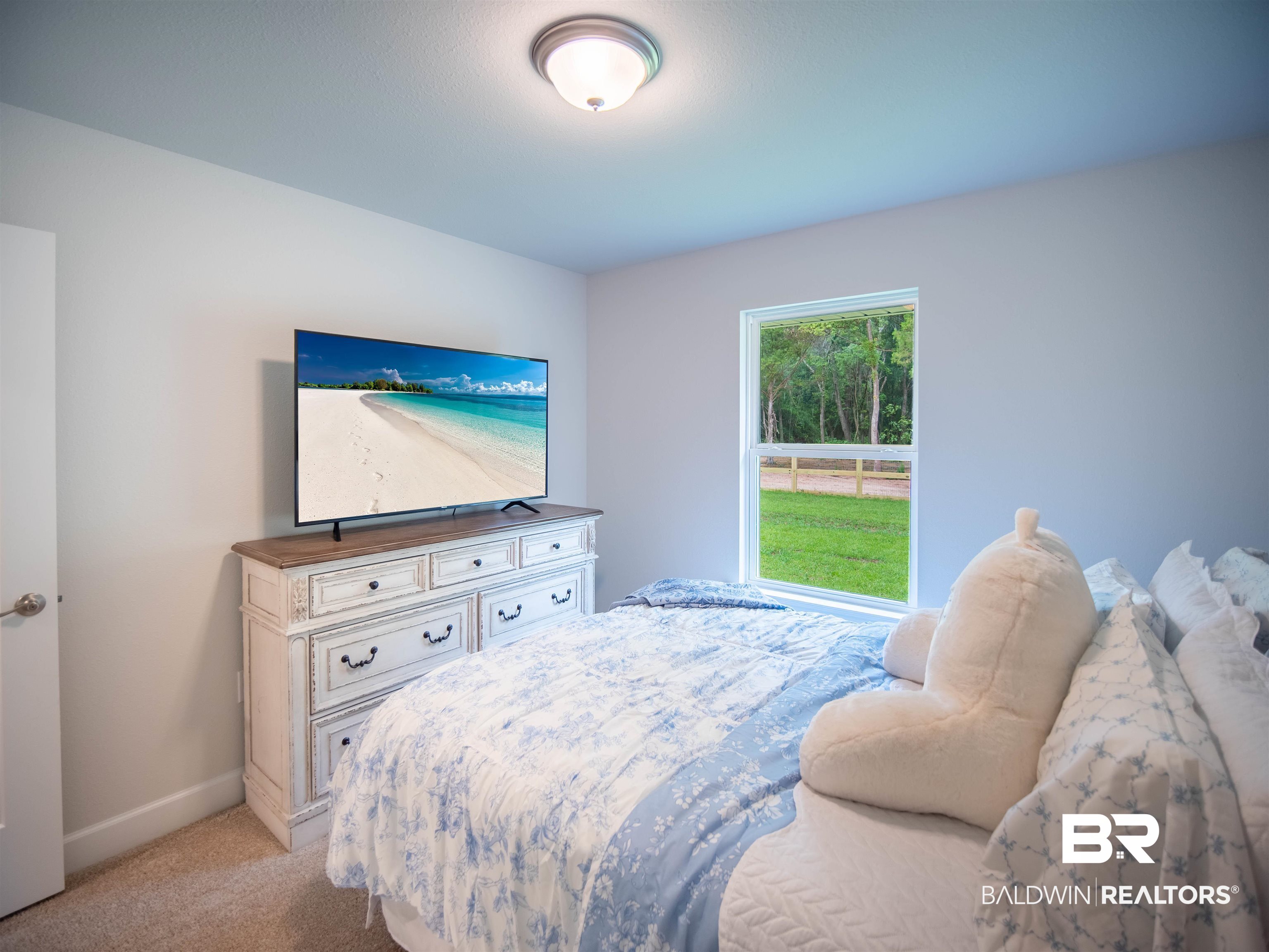 12646 Michigan Avenue Elberta, AL 36530 - Photo 24 of 47 Bedroom with light carpet and baseboards