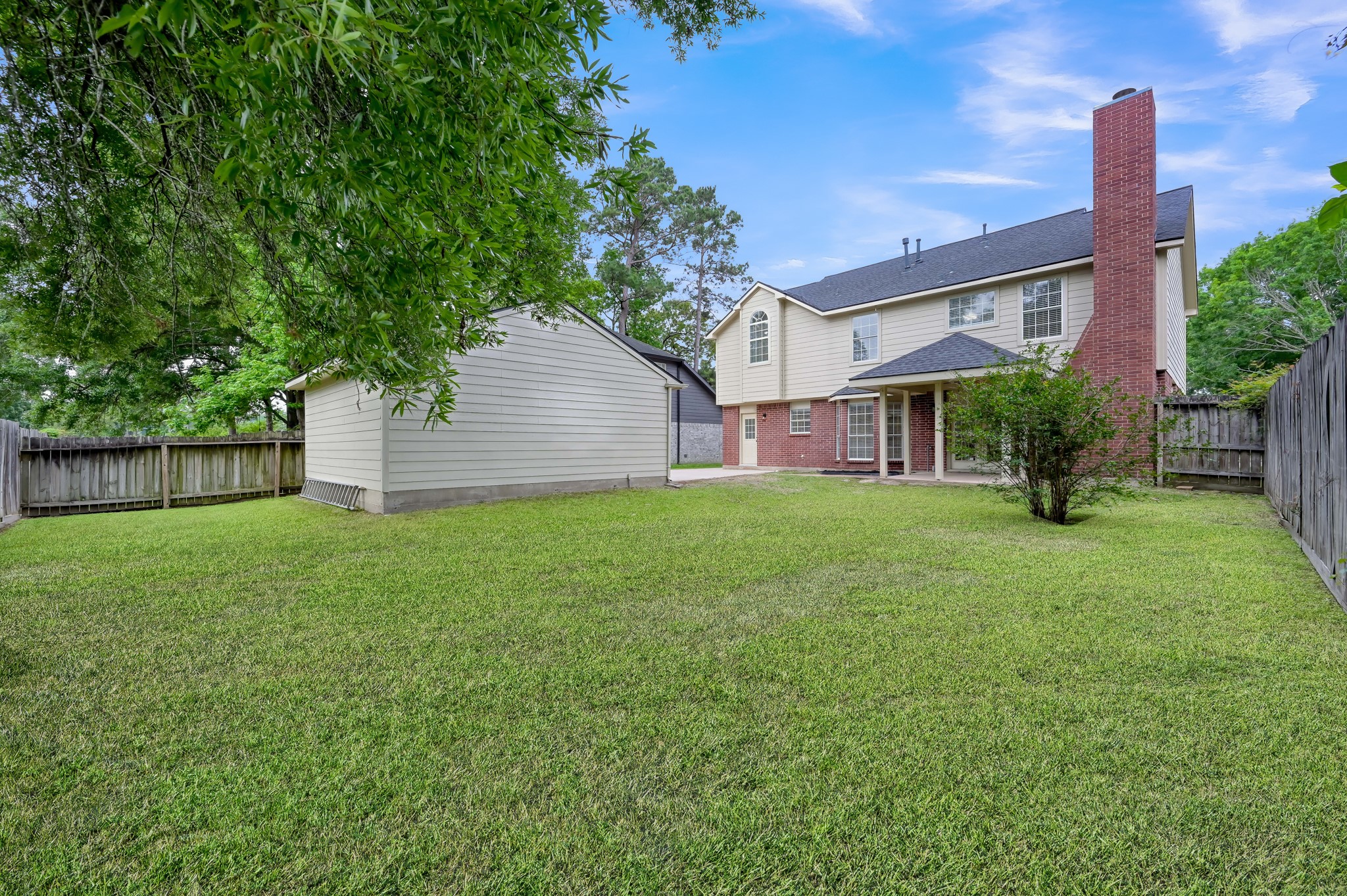 114 Regency Way Conroe, TX 77304 - Photo 43 of 48 Nice size back yard with mature tree. Beautiful mature trees throughout the neighborhood.