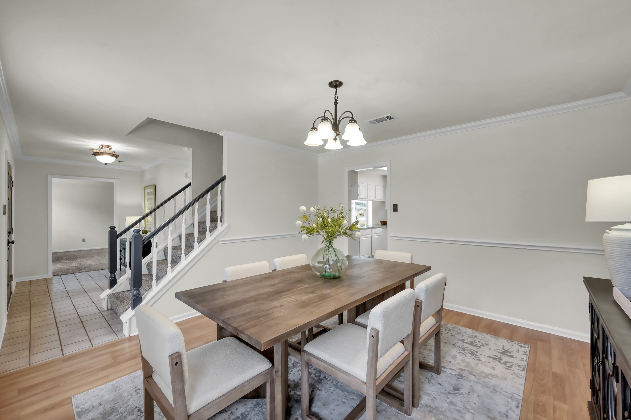 114 Regency Way Conroe, TX 77304 - Photo 6 of 48 Formal dining with crown molding and chair rail feature.
