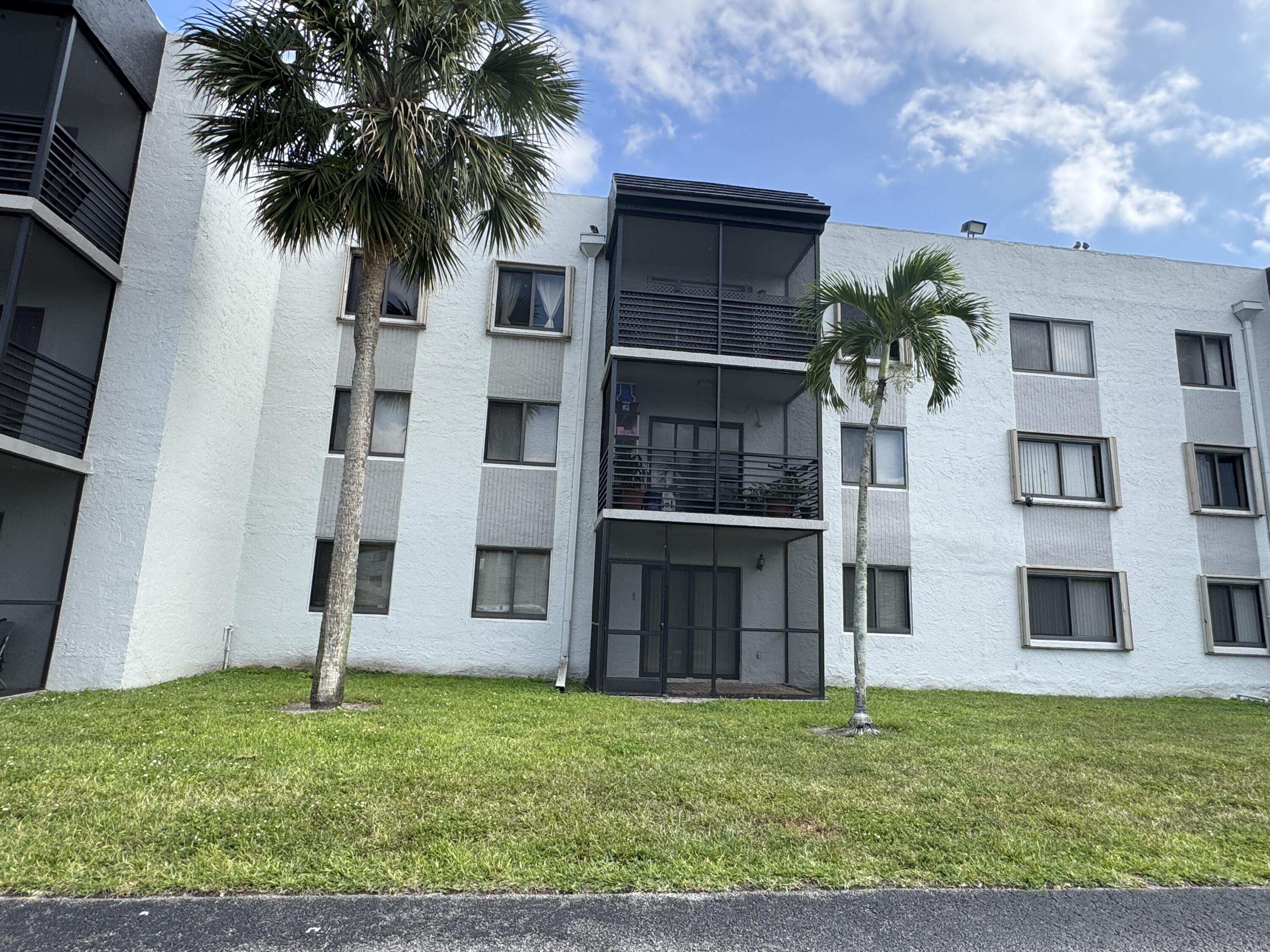 3710 North Pine Island Road, Unit 122 Sunrise, FL 33351 - Photo 35 of 39 a view of house with yard