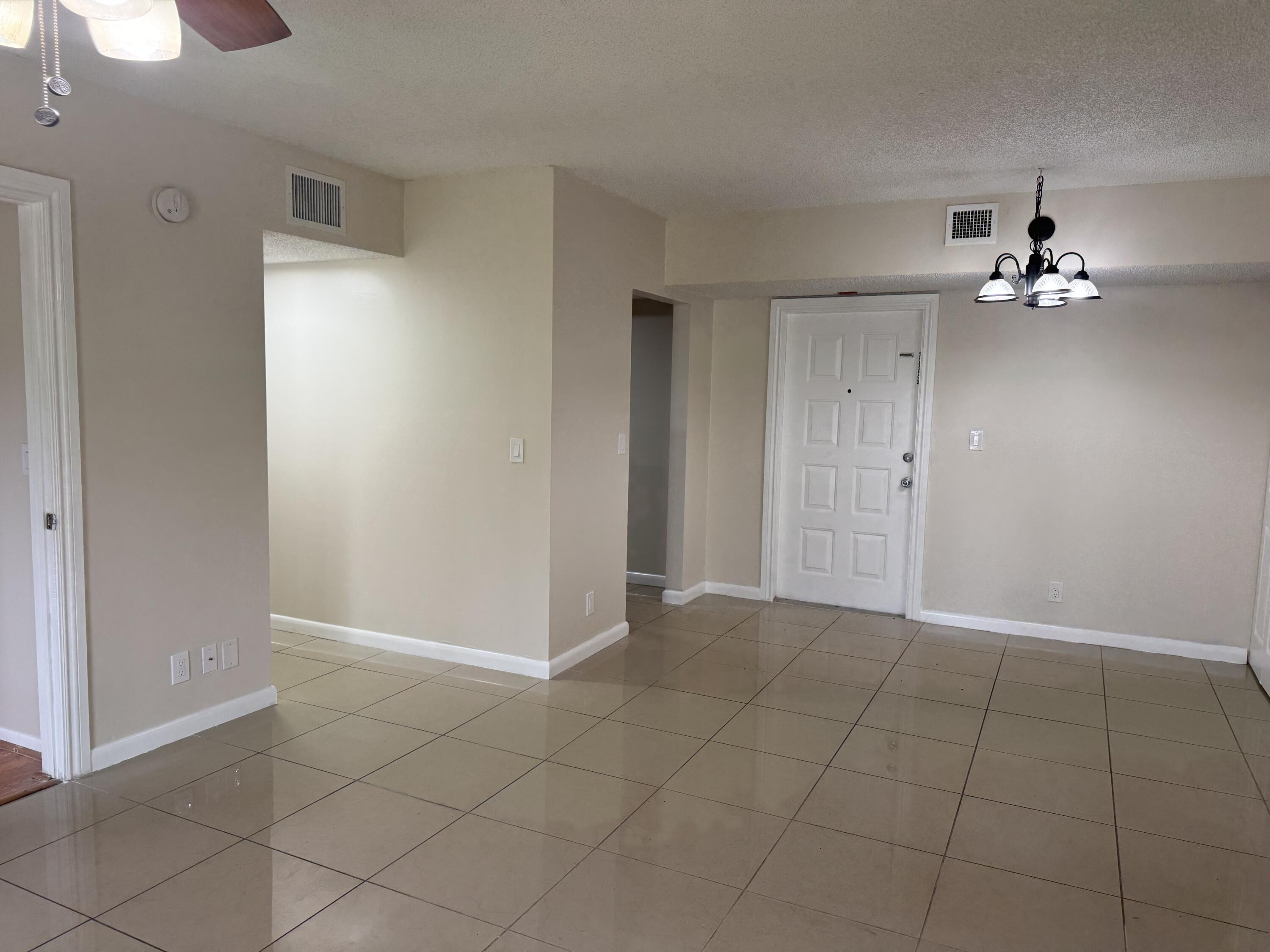 3710 North Pine Island Road, Unit 122 Sunrise, FL 33351 - Photo 5 of 39 a view of an empty room