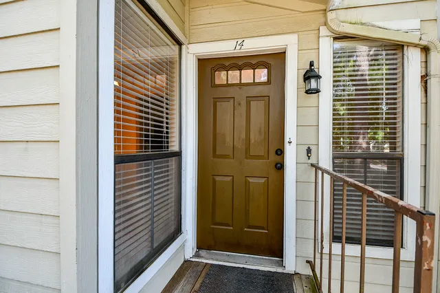 a view of a door and a window