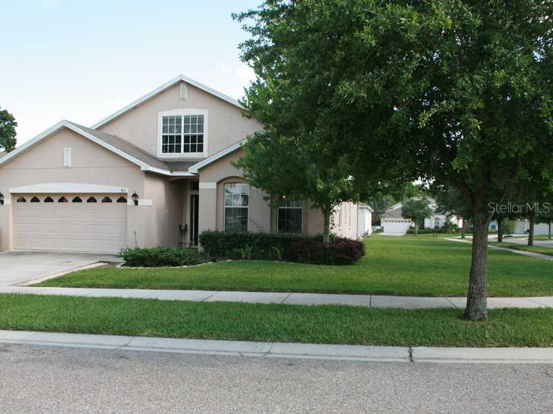 401 Thicket Crest Road Seffner, FL 33584 - Photo 1 of 1 a front view of a house with a yard