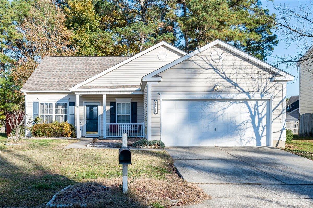 8616 Neuse Stone Drive Raleigh, NC 27616 - Photo 1 of 24 a view of a house with backyard