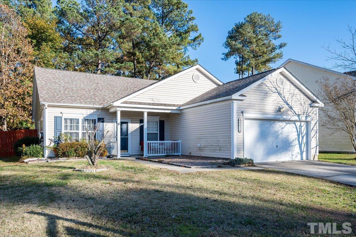 8616 Neuse Stone Drive Raleigh, NC 27616 - Photo 2 of 24 a view of house with yard