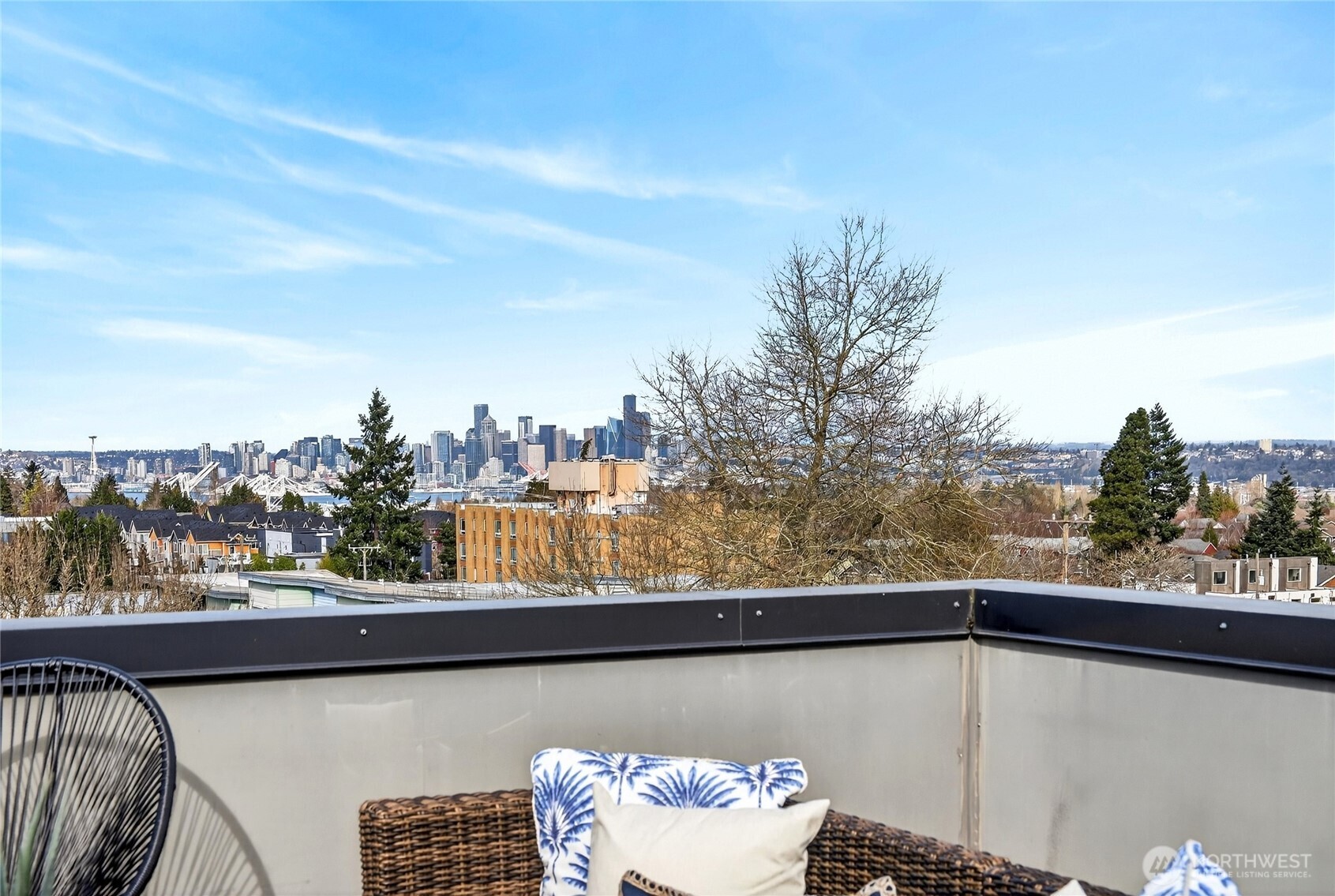 6543 35th Avenue Southwest, Unit B Seattle, WA 98126 - Photo 29 of 37 a view of a lake from a balcony