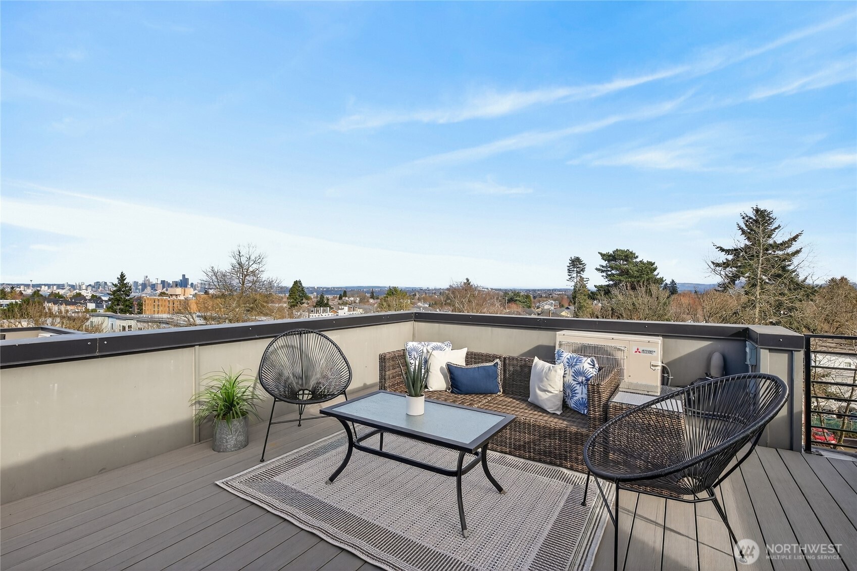 6543 35th Avenue Southwest, Unit B Seattle, WA 98126 - Photo 32 of 37 a terrace with outdoor seating and trees