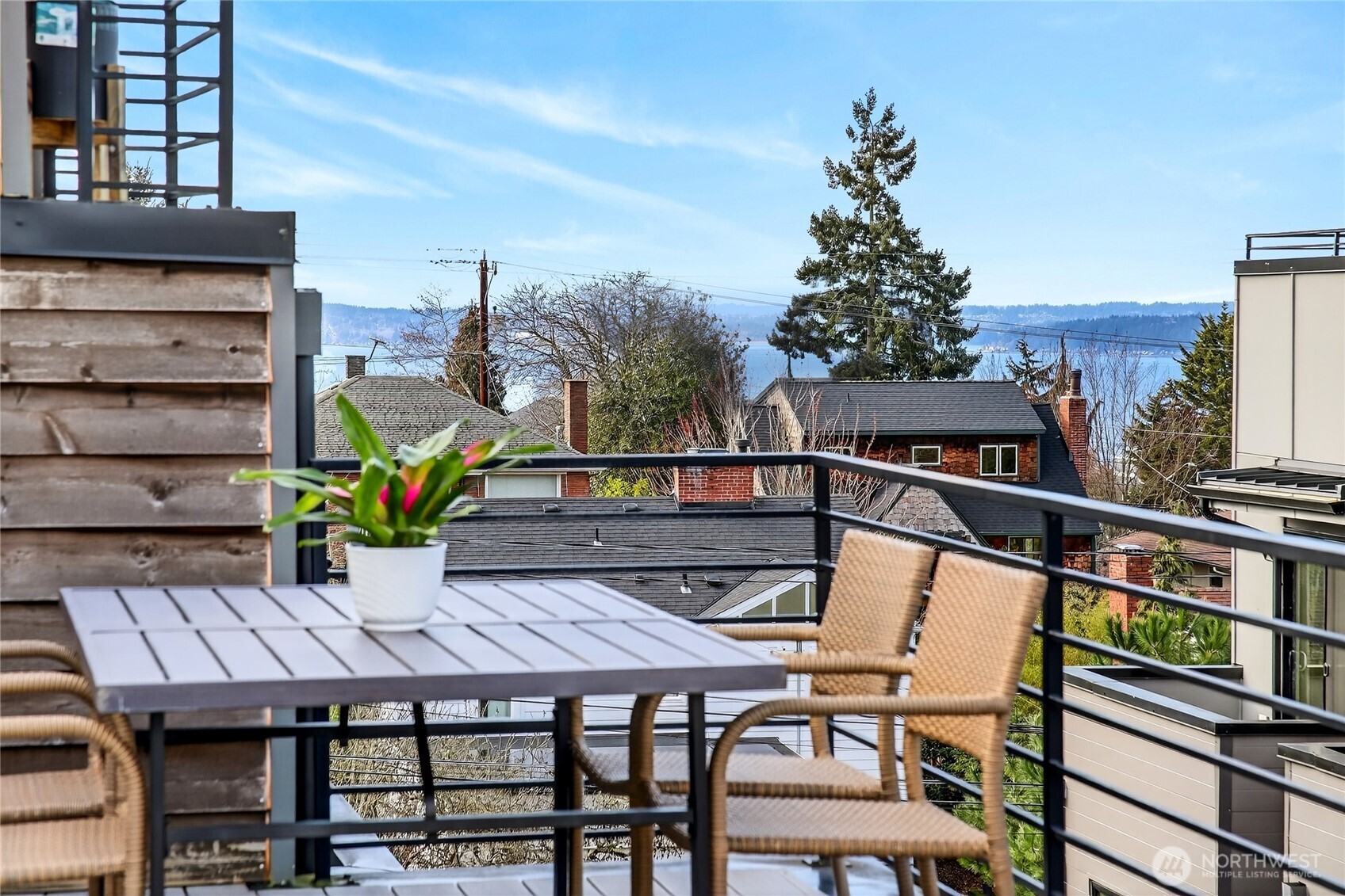 6543 35th Avenue Southwest, Unit B Seattle, WA 98126 - Photo 33 of 37 a view of a chairs and table on the terrace