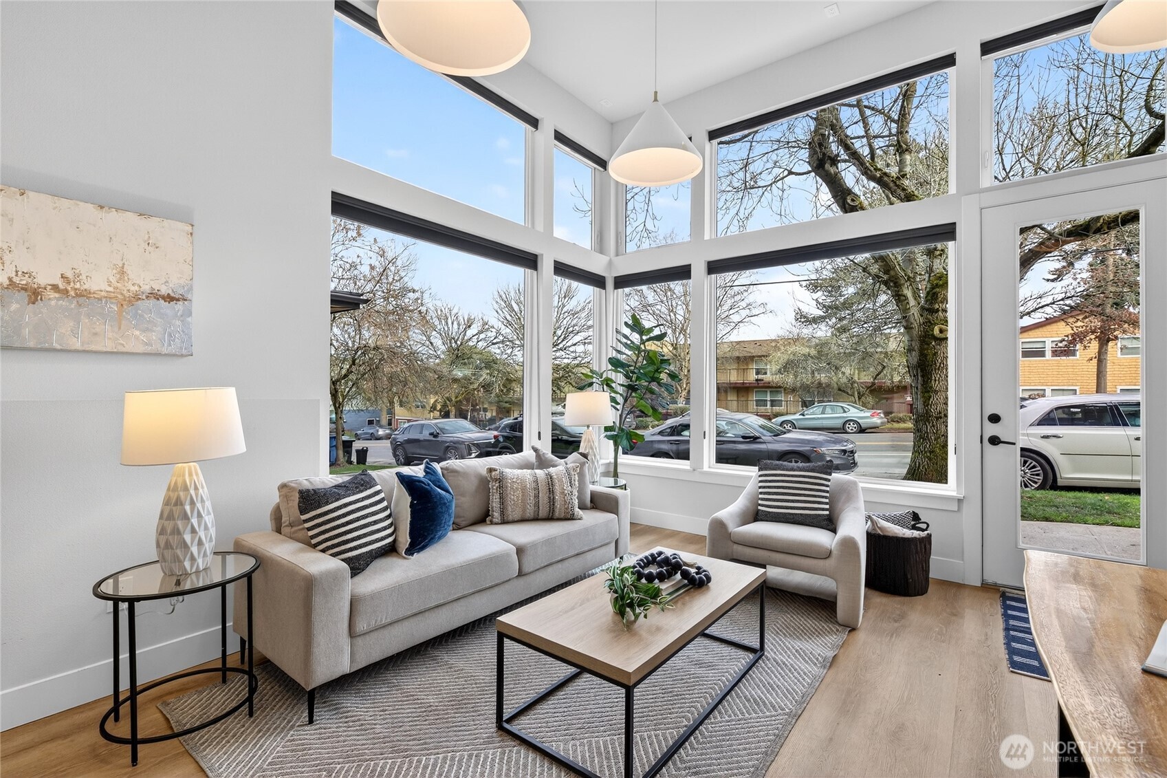 6543 35th Avenue Southwest, Unit B Seattle, WA 98126 - Photo 5 of 37 a living room with furniture and a large window