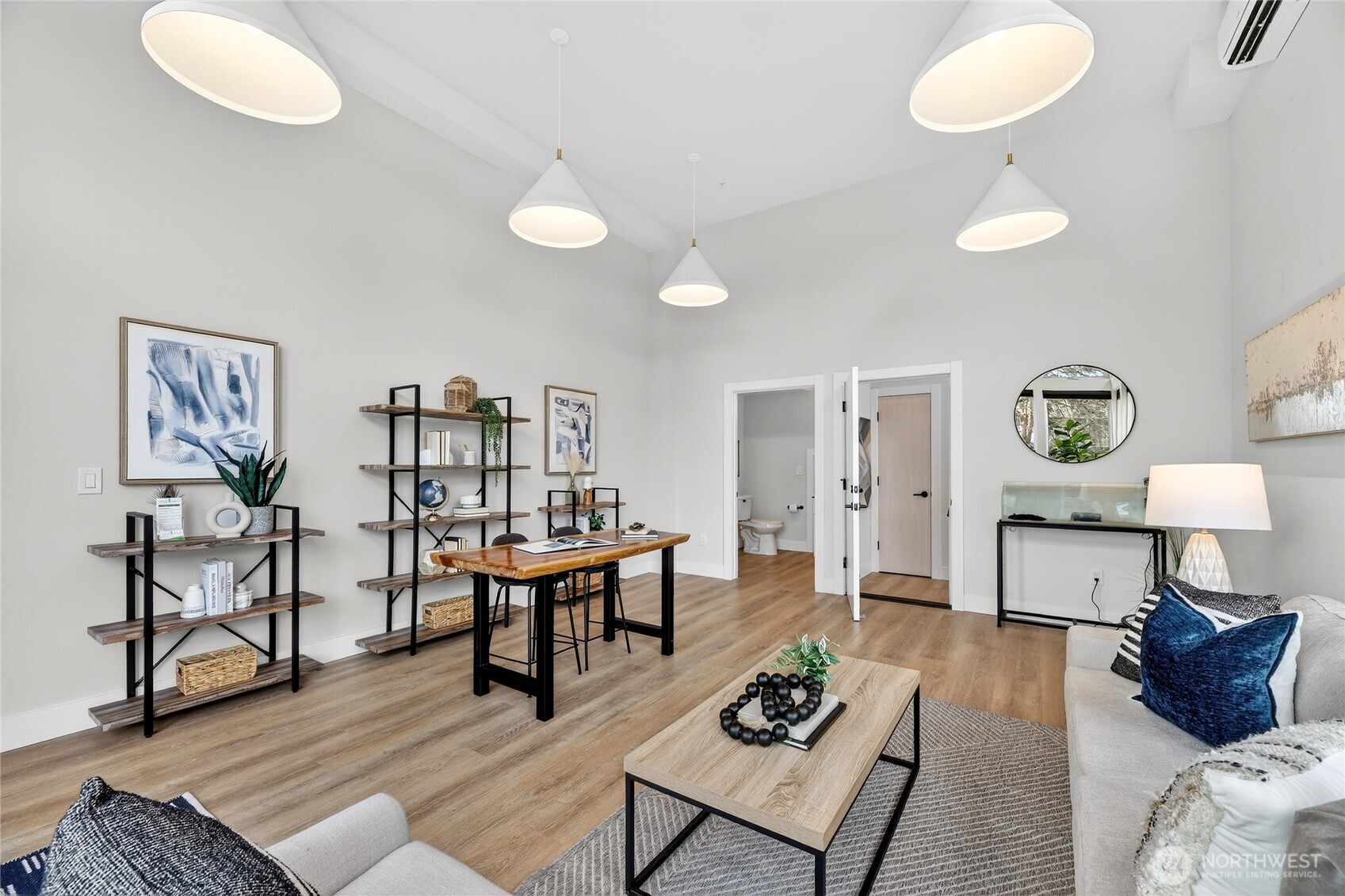 6543 35th Avenue Southwest, Unit B Seattle, WA 98126 - Photo 9 of 37 a living room with furniture and a wooden floor