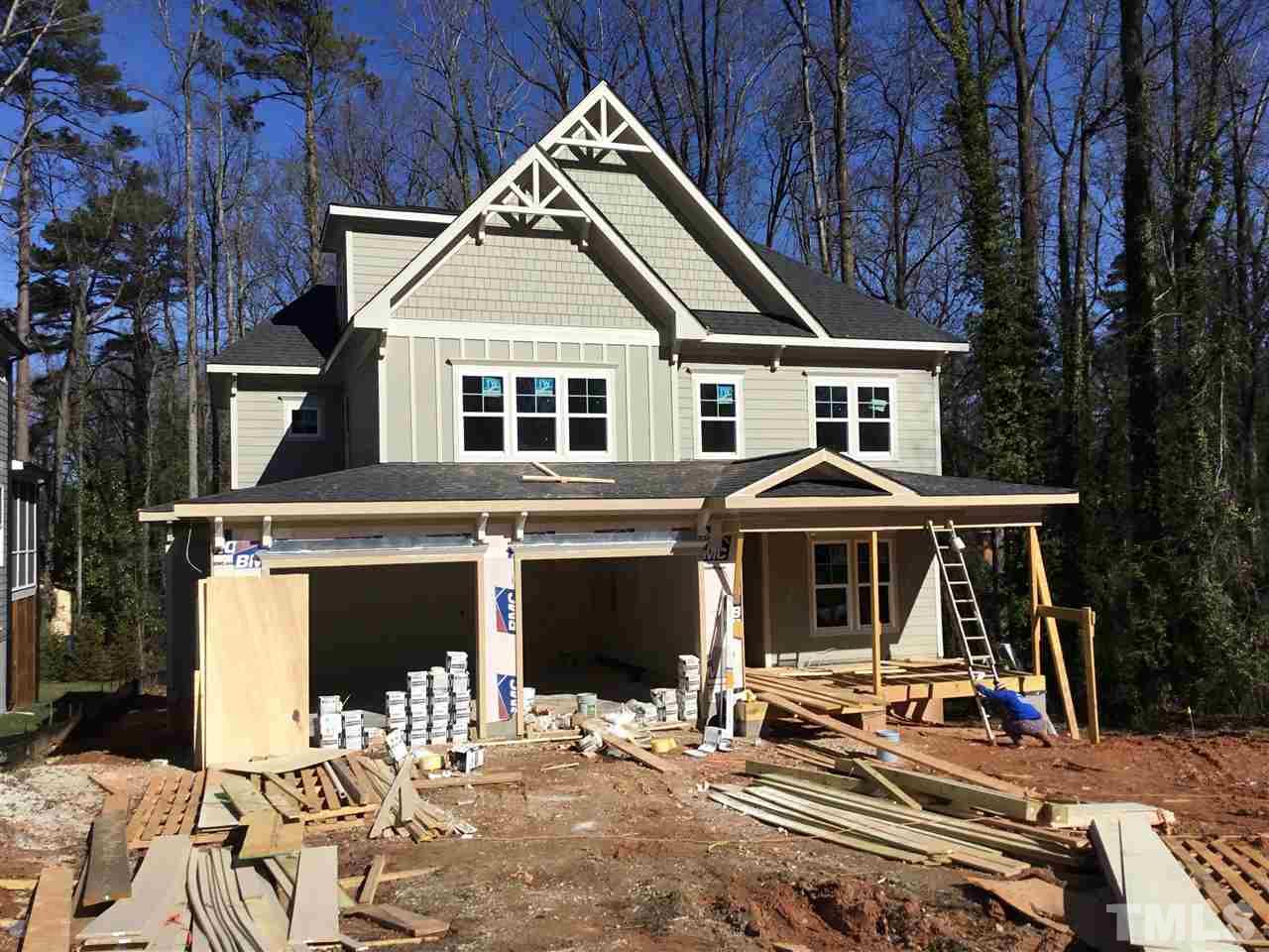 2816 Barmettler Street Raleigh, NC 27607 - Photo 1 of 1 a front view of a house with a yard