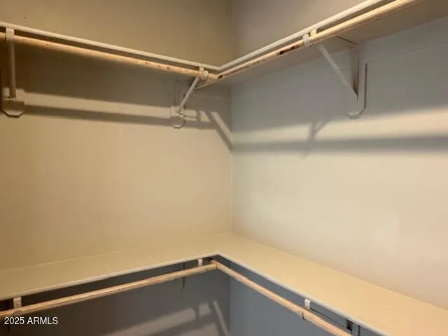 a view of a room with racks on the wall