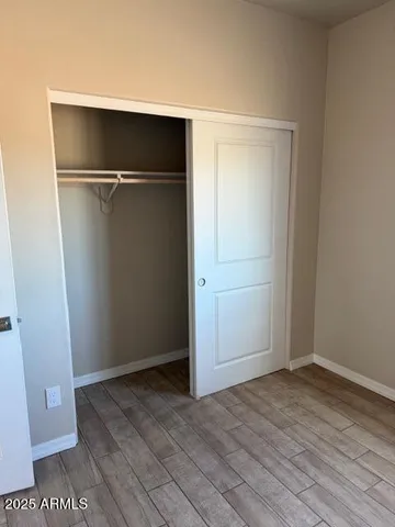 a view of an empty walk in closet