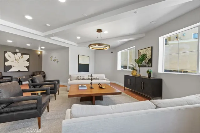 a view of livingroom with furniture and couches