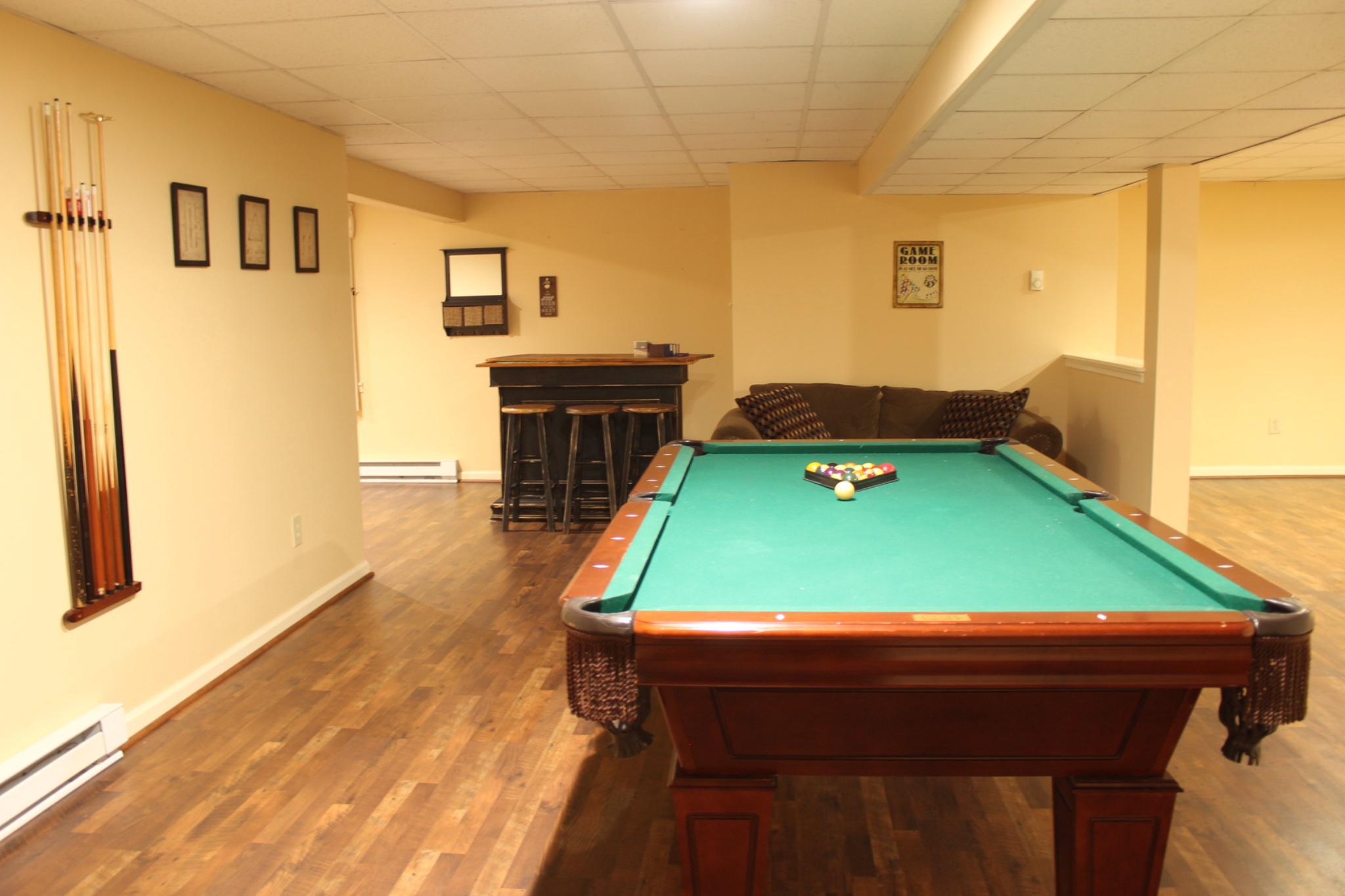 119 Constitution Avenue Reading, PA 19606 - Photo 10 of 15 a room with pool table and windows