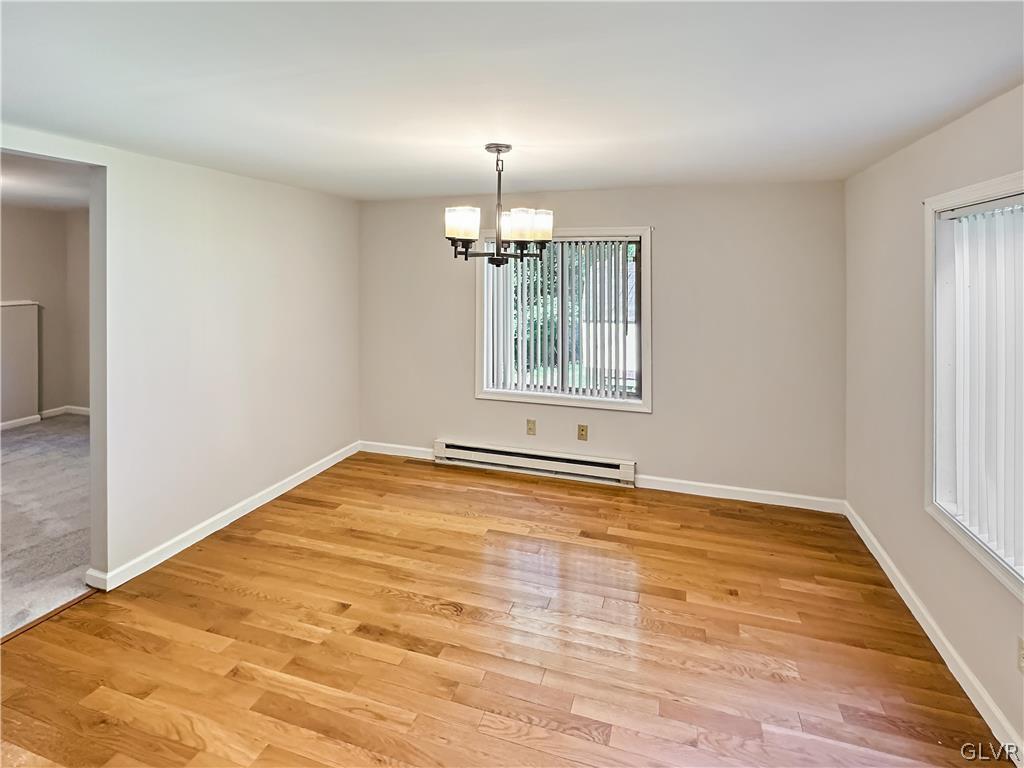 1432 Clover Road Long Pond, PA 18334 - Photo 5 of 16 a view of an empty room with a window