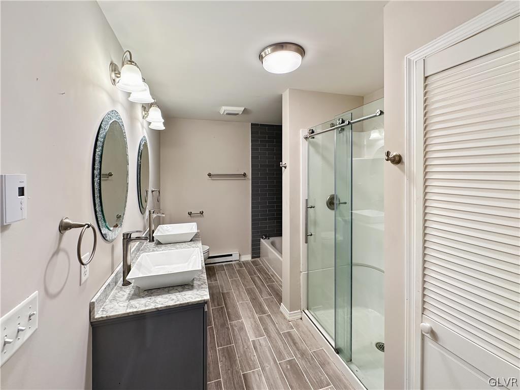 1432 Clover Road Long Pond, PA 18334 - Photo 7 of 16 a bathroom with a sink mirror and a shower