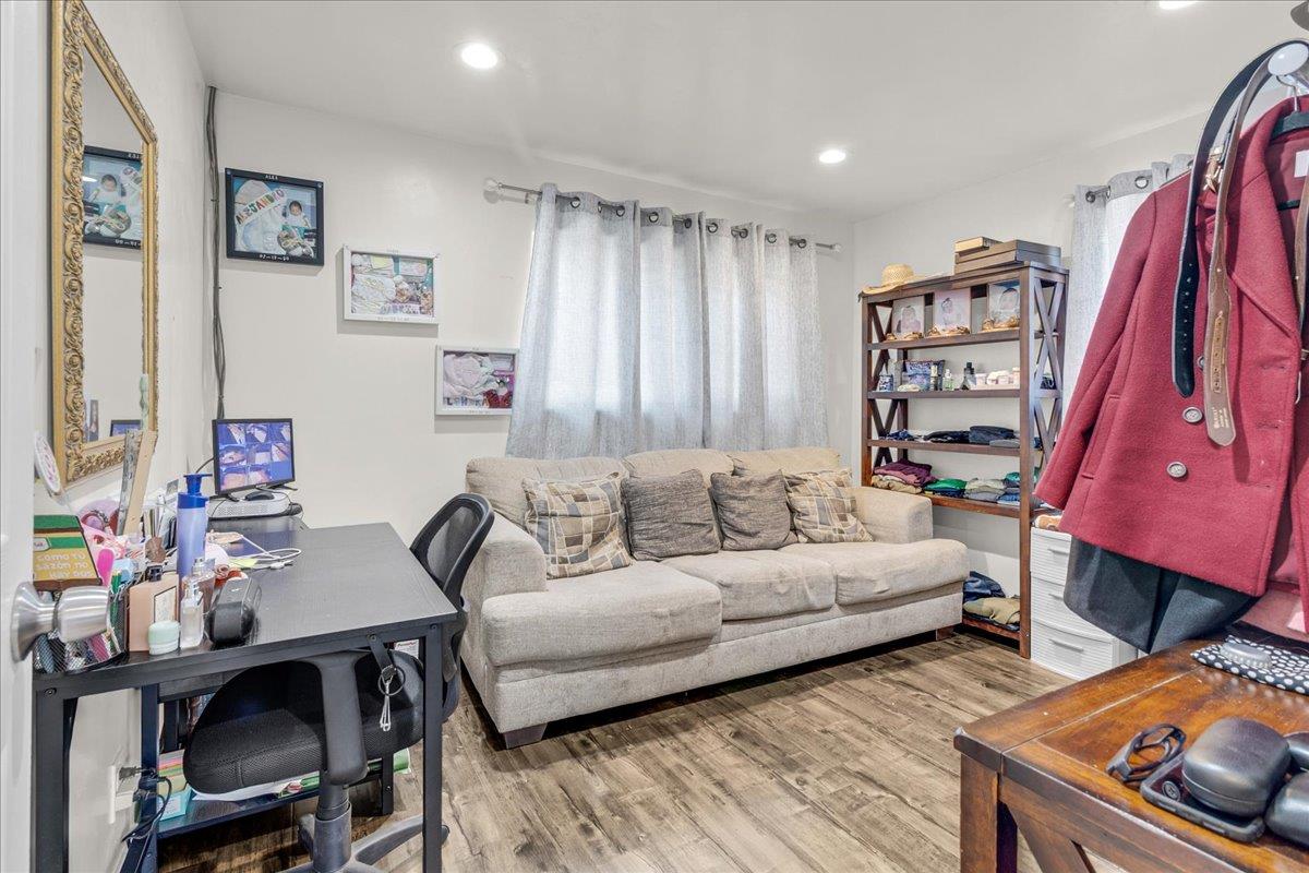 18810 Moro Road Salinas, CA 93907 - Photo 11 of 40 a living room with furniture a flat screen tv and a window