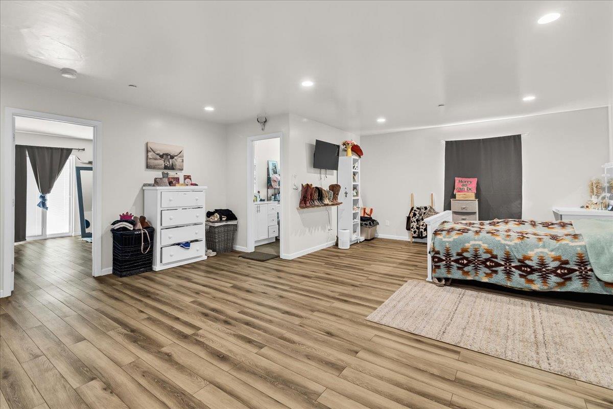 18810 Moro Road Salinas, CA 93907 - Photo 18 of 40 a bedroom with a bed and a large mirror on the dresser