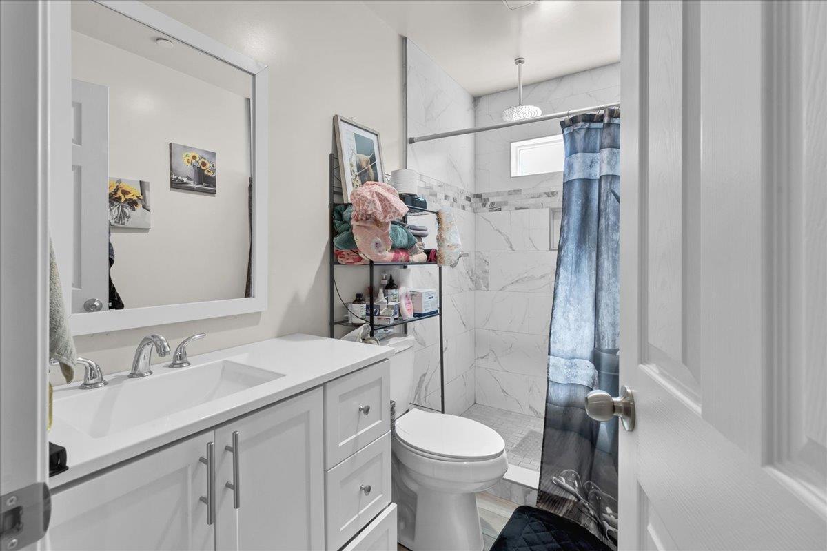 18810 Moro Road Salinas, CA 93907 - Photo 20 of 40 a bathroom with a sink toilet and shower
