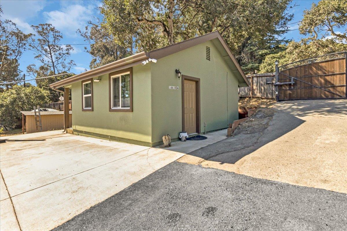 18810 Moro Road Salinas, CA 93907 - Photo 24 of 40 a front view of a house with a yard and garage