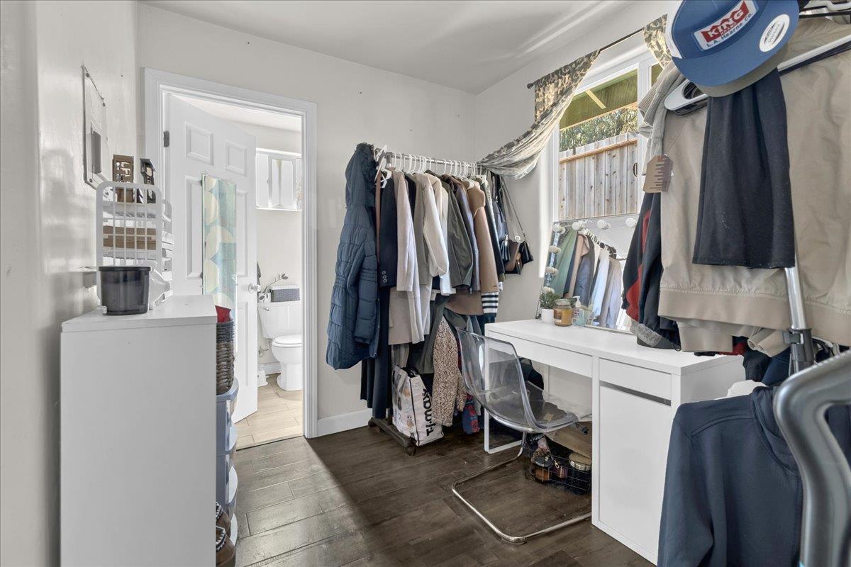 18810 Moro Road Salinas, CA 93907 - Photo 30 of 40 a view of walk in closet with clothes and shoes