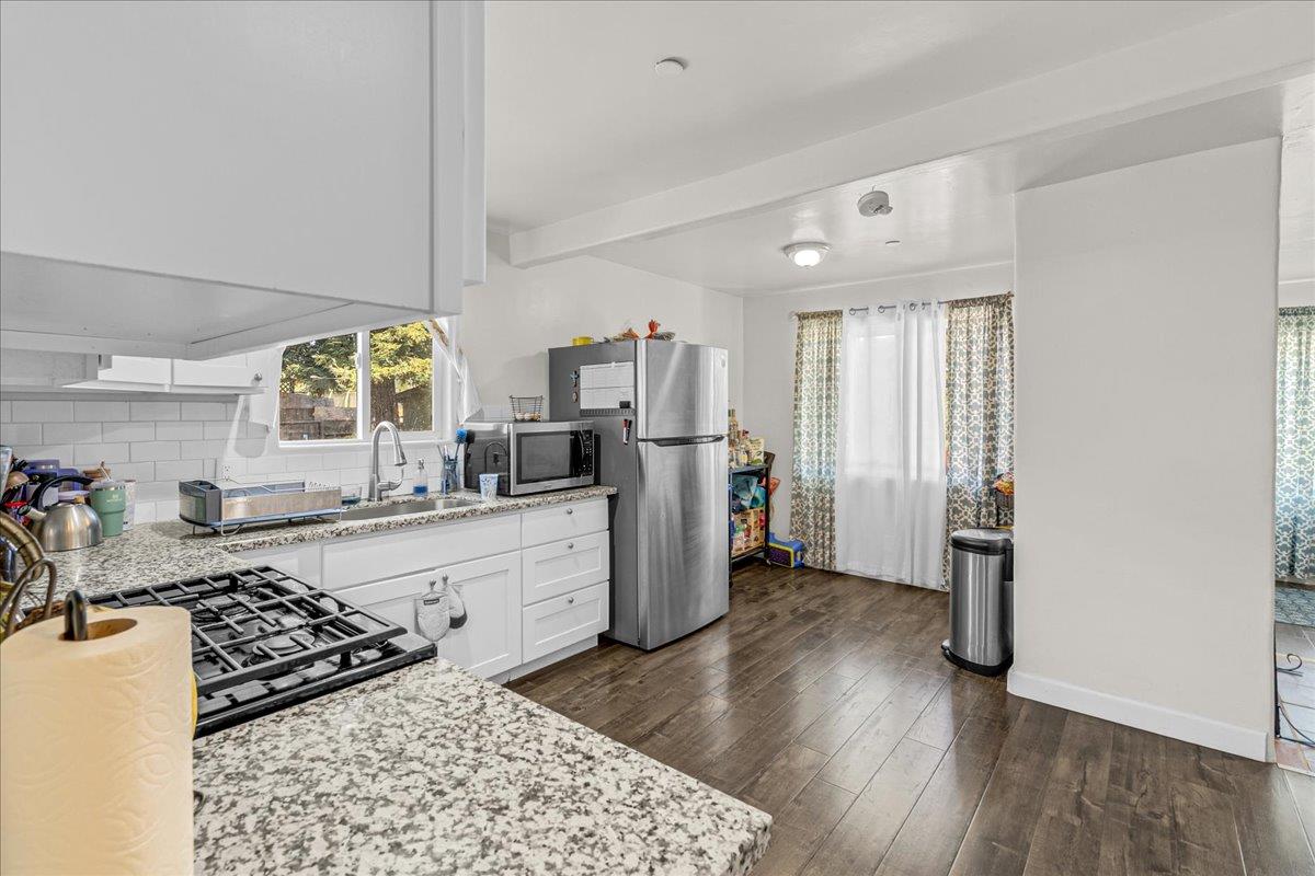 18810 Moro Road Salinas, CA 93907 - Photo 10 of 40 a kitchen with stainless steel appliances granite countertop a refrigerator oven stove a sink and dishwasher