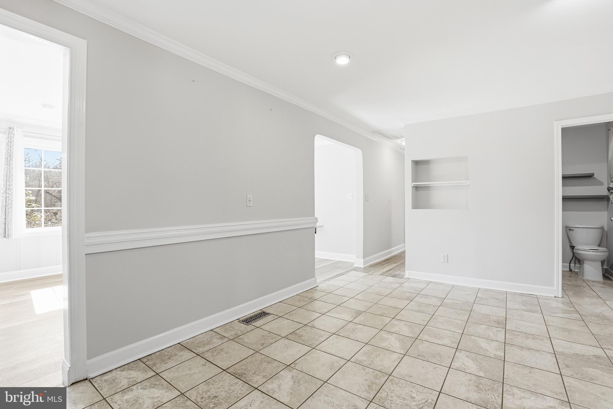 8324 Newland Road Warsaw, VA 22572 - Photo 12 of 31 a view of an empty room and window