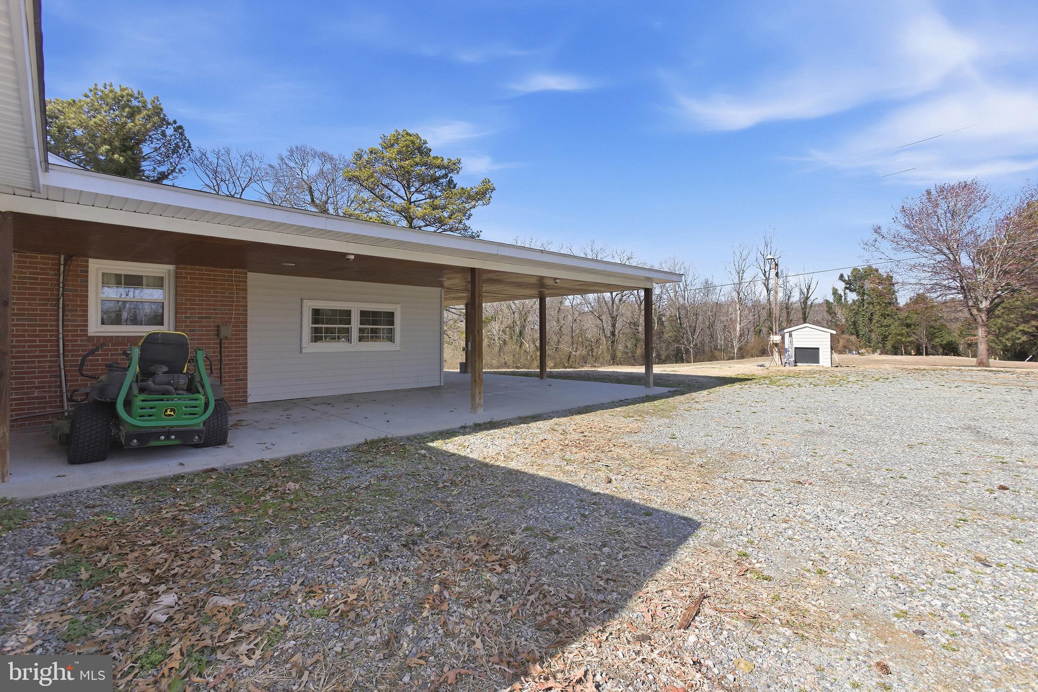 8324 Newland Road Warsaw, VA 22572 - Photo 30 of 31 a view of outdoor space yard and porch