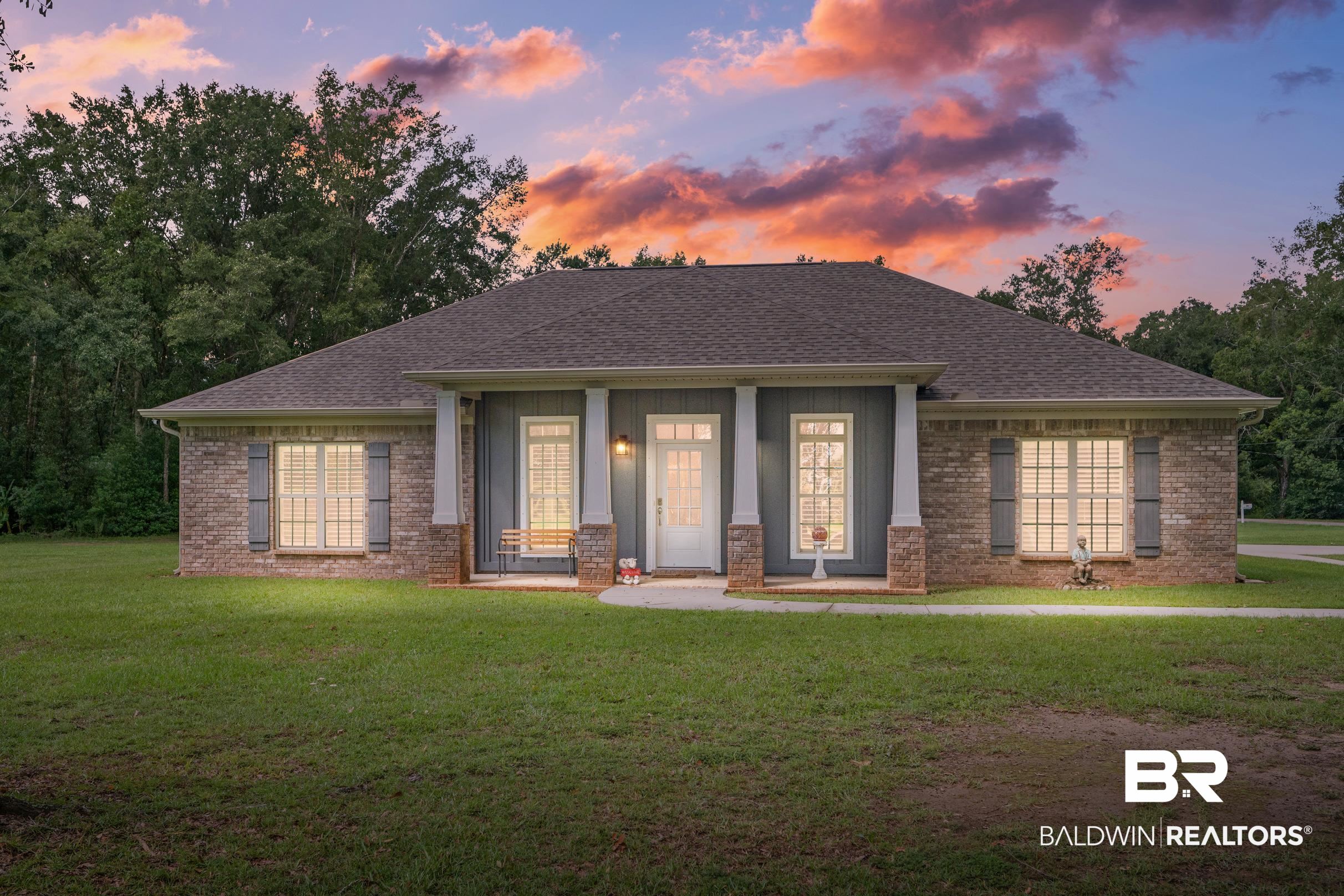 1700 South Juniper Street Foley, AL 36535 - Photo 4 of 51 View of front of home with a lawn