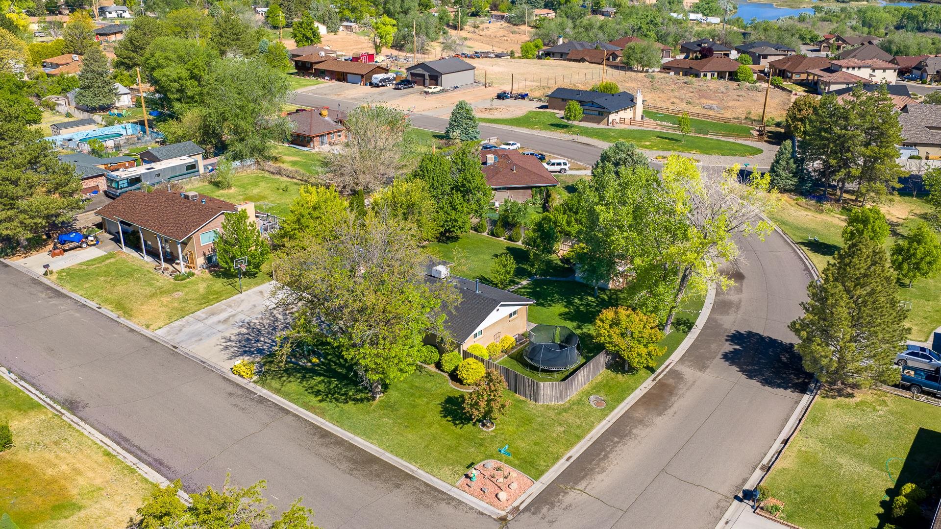 2118 Saguaro Road Grand Junction, CO 81507 - Photo 35 of 42 an aerial view of residential houses with outdoor space