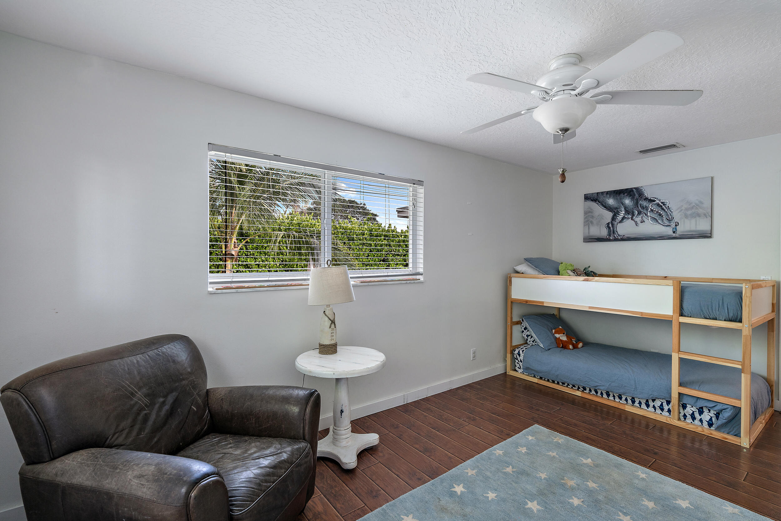 356 Mars Avenue Tequesta, FL 33469 - Photo 22 of 27 a living room with furniture and a window