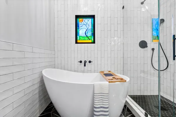 a bathroom with a sink and a shower