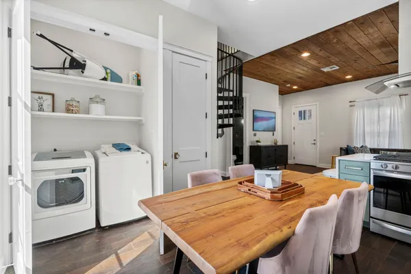 a view of a dining room with furniture