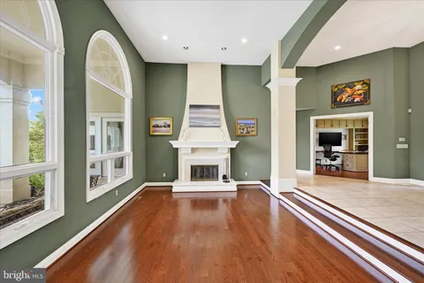 a view of a living room with a large window