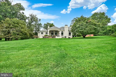 a view of a house with a big yard