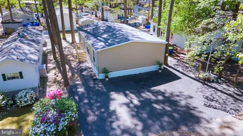 a view of a backyard with a garden