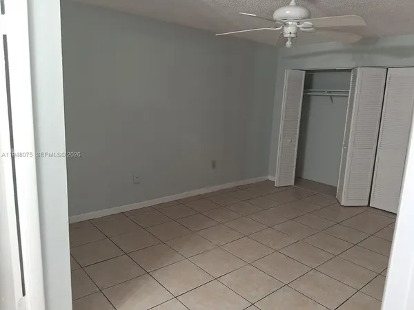 a bathroom with a toilet a sink and bathtub