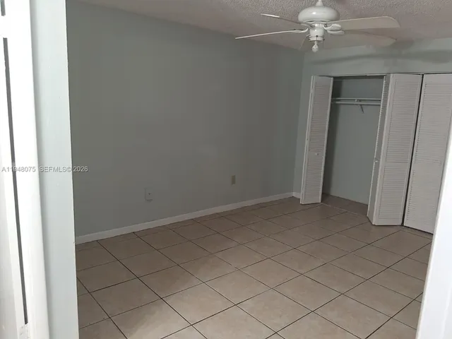 a bathroom with a toilet a sink and bathtub
