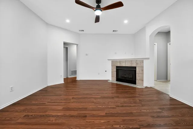 a view of living room filled with furniture and window