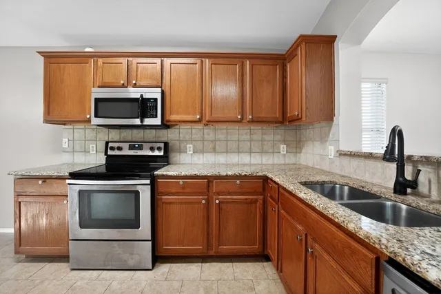 a view of a kitchen with a sink