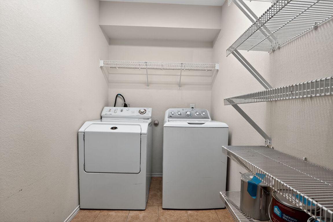 1502 McDowell Bend Leander, TX 78641 - Photo 30 of 31 a utility room with dryer and washer