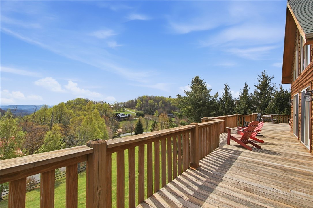 2081 Blackberry Road Boone, NC 28607 - Photo 6 of 45 a view of a balcony with wooden floor and fence