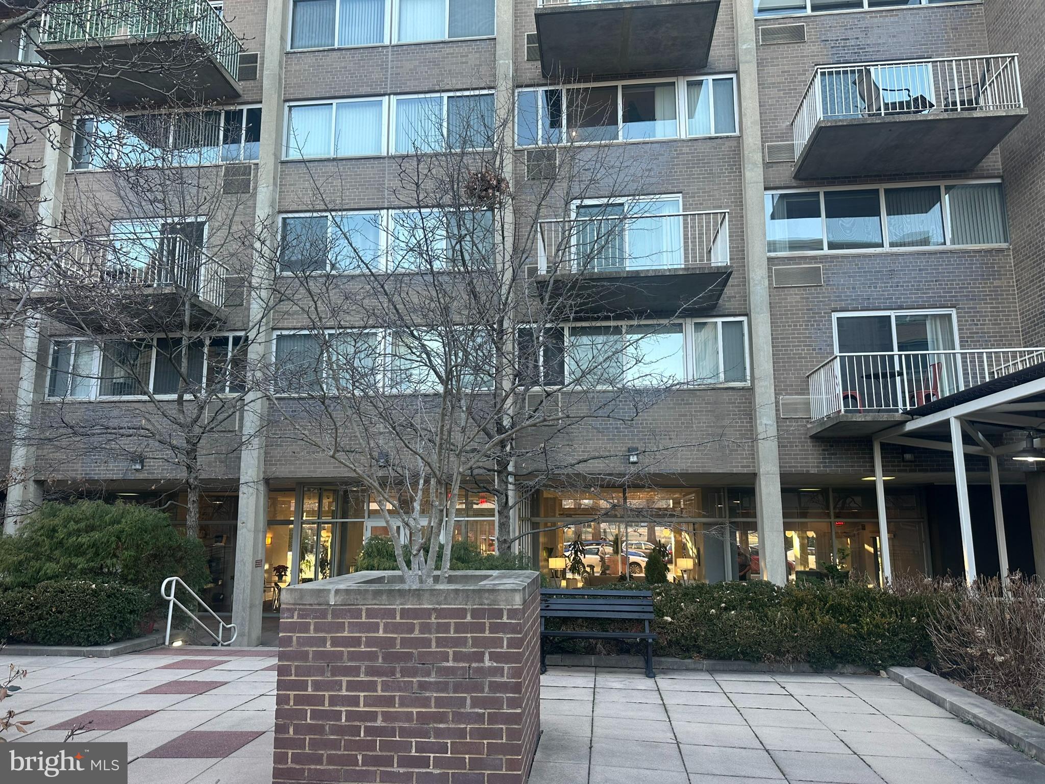 800 4th Street Southwest, Unit S325 Washington, DC 20024 - Photo 16 of 17 a front view of a building with a garden