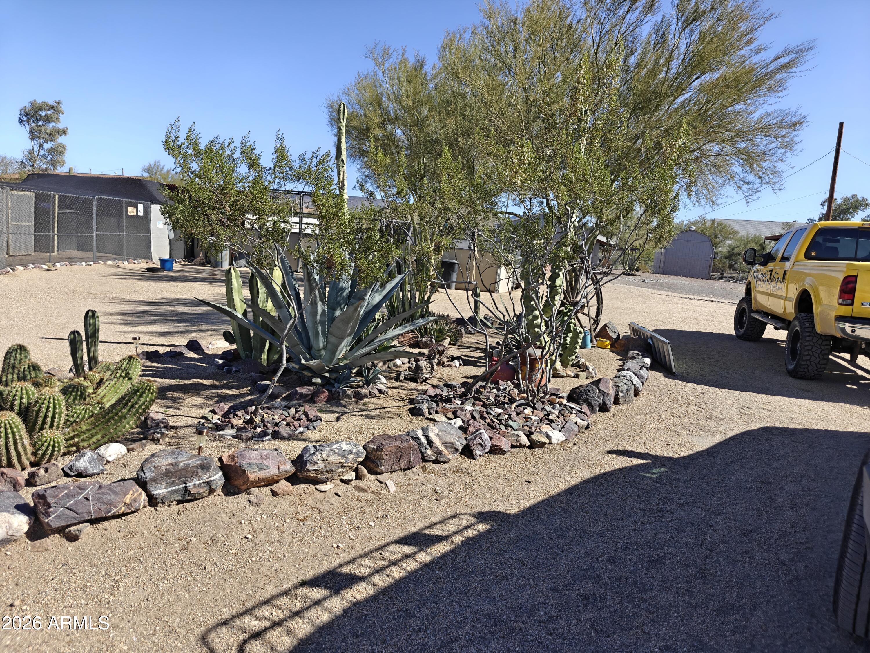 2417 West Roughrider Road New River, AZ 85087 - Photo 50 of 61 a view of a backyard of the house