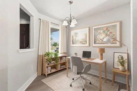 a kitchen with stainless steel appliances granite countertop a stove a refrigerator and a cabinets