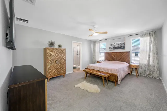 a view of a bathroom with wooden floor