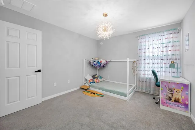 a spacious bathroom with a granite countertop sink mirror and