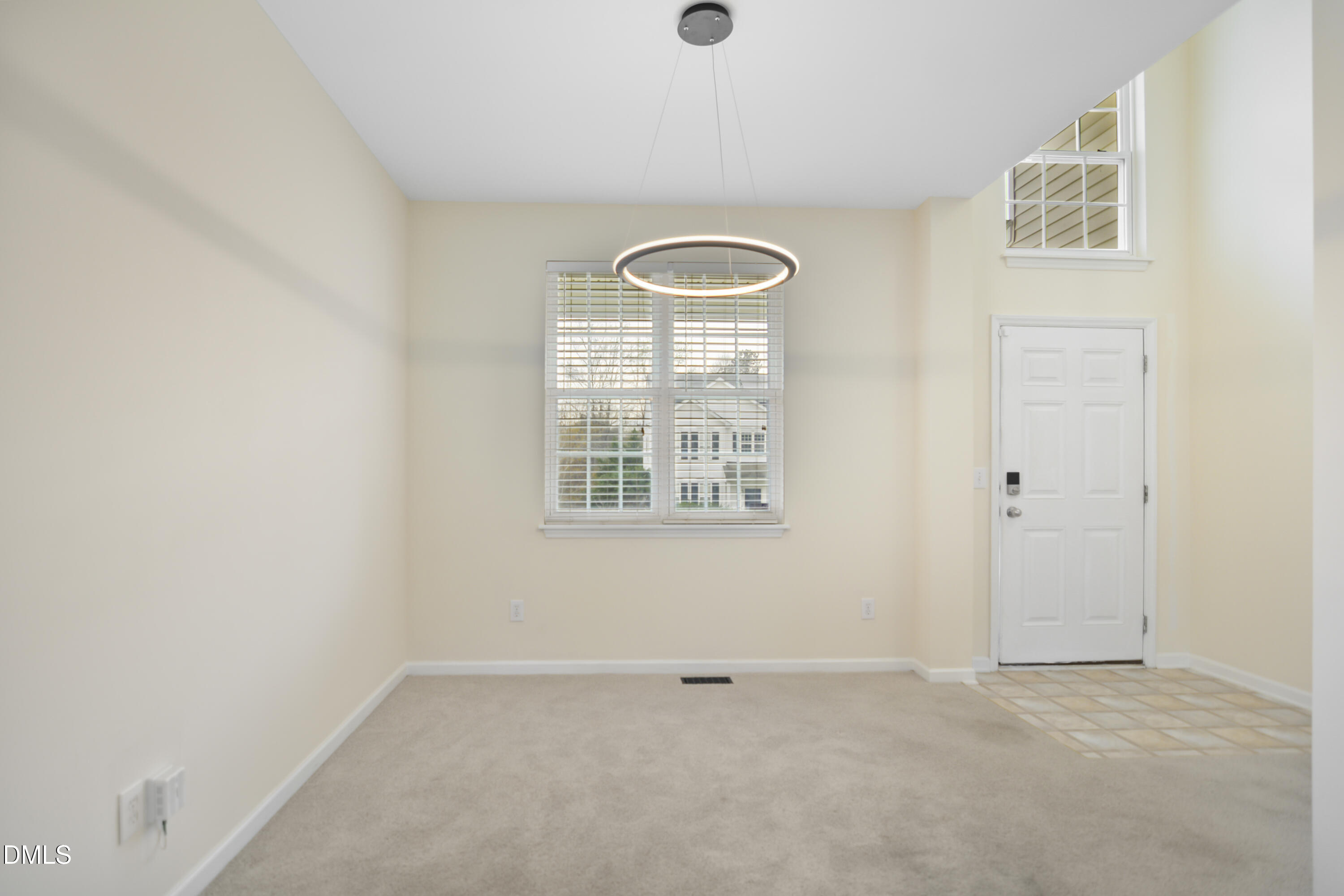 2241 Spruce Shadows Lane Raleigh, NC 27614 - Photo 3 of 29 an empty room with windows